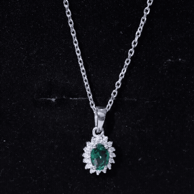 Lab grown 0.85 carat emerald oval pendant with chain by Rosec Jewels, featuring a stunning green gemstone and elegant design.
