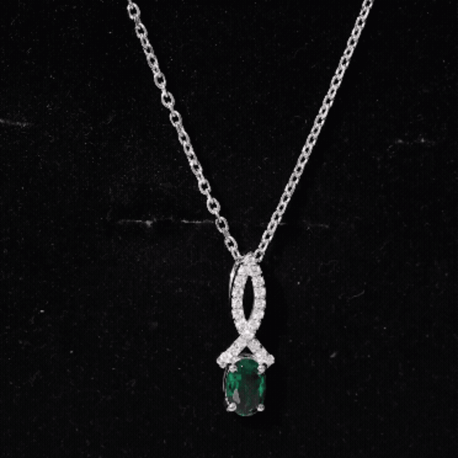 Oval lab-created emerald pendant necklace with chain, featuring a 0.85 carat gemstone, by Rosec Jewels.