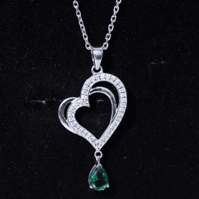 Sterling Silver 0.7 Carat Lab Grown Emerald Heart Locket with Chain