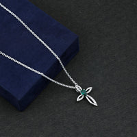 Pear Cut Emerald Cross Pendant With Lab Grown Diamond