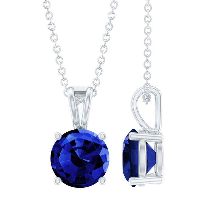 Lab blue sapphire solitaire pendant necklace with silver chain by Rosec Jewels, showcasing a 2.7 carat round sapphire and sterling silver chain.