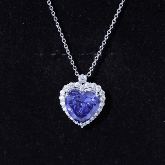 Yellow lab-grown blue sapphire Heart of the Ocean pendant necklace by Rosec Jewels, showcasing a sparkling heart-shaped gemstone.