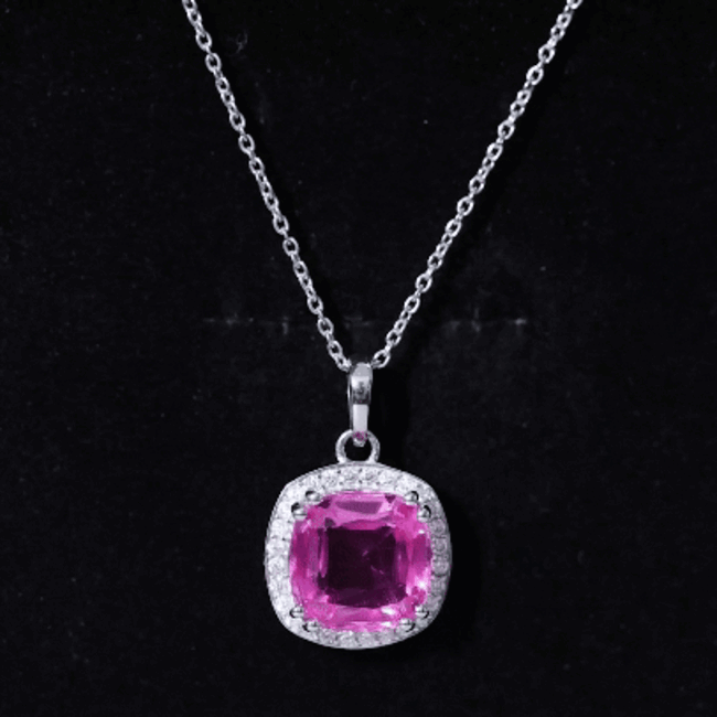 Lab grown pink sapphire pendant necklace with 6 carats, silver chain, from Rosec Jewels, featuring a sparkling pink gemstone.