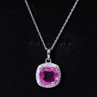 Lab grown pink sapphire pendant necklace with 6 carats, silver chain, from Rosec Jewels, featuring a sparkling pink gemstone.