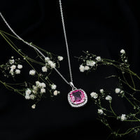 Lab grown pink sapphire cocktail pendant with 6 carats on a silver chain, featuring a sparkling pink gemstone and elegant design.