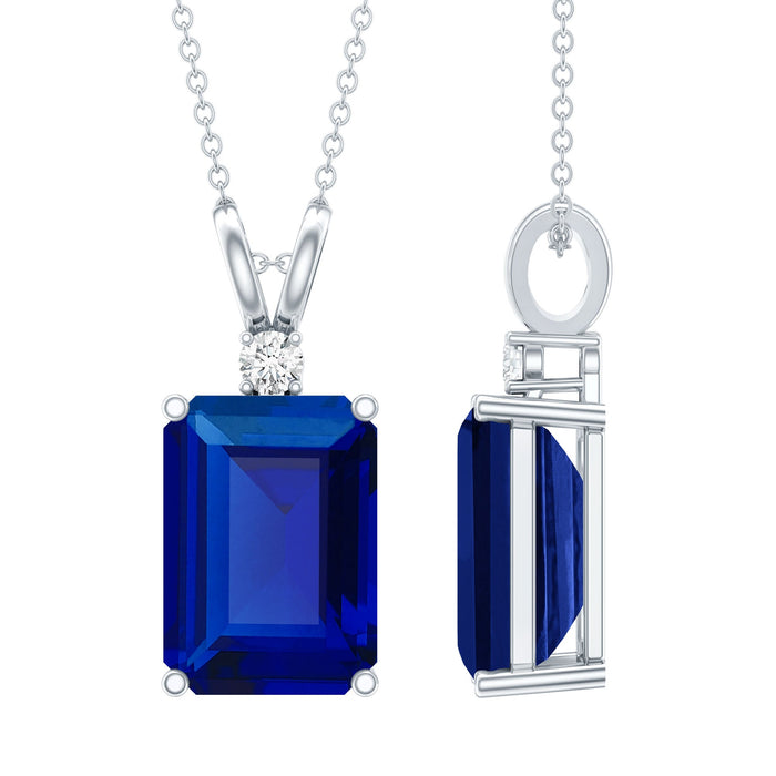 Lab-grown blue sapphire solitaire pendant with 9-carat emerald cut gemstone on silver chain, from Rosec Jewels.