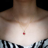 Certified lab-created ruby heart infinity pendant necklace with chain by Rosec Jewels, showcasing a sparkling ruby heart design.
