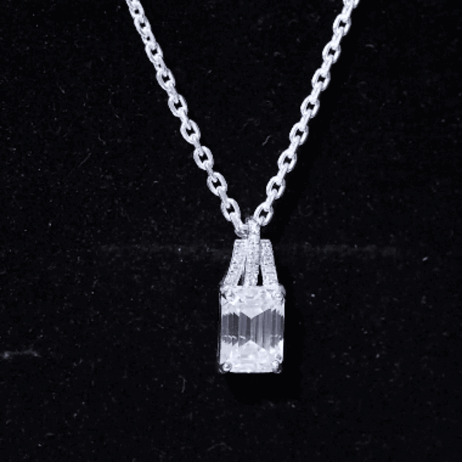 Yellow lab-grown diamond solitaire pendant in 6x8 mm emerald cut, featuring a delicate necklace from Rosec Jewels.