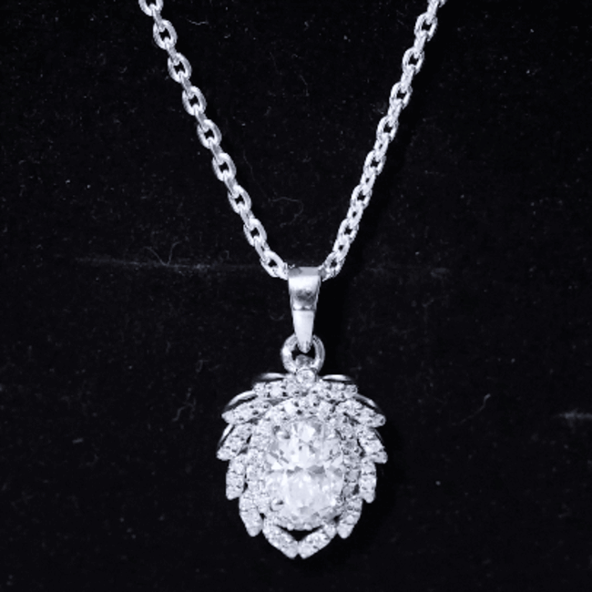 Yellow gold vintage pendant necklace featuring a 1.2 carat oval lab-grown diamond with a double halo design by Rosec Jewels