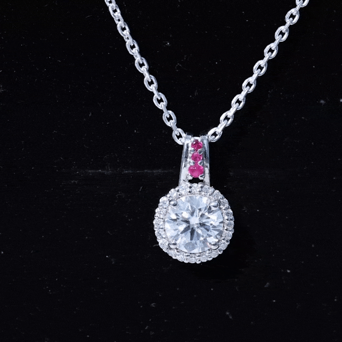 Yellow gold pendant with a lab-grown diamond halo and ruby accent bail, elegant jewelry piece by Rosec Jewels