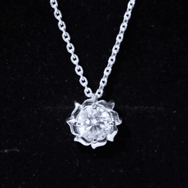 Yellow pendant featuring a 2-carat solitaire lab-grown diamond flower design by Rosec Jewels, showcasing intricate craftsmanship.