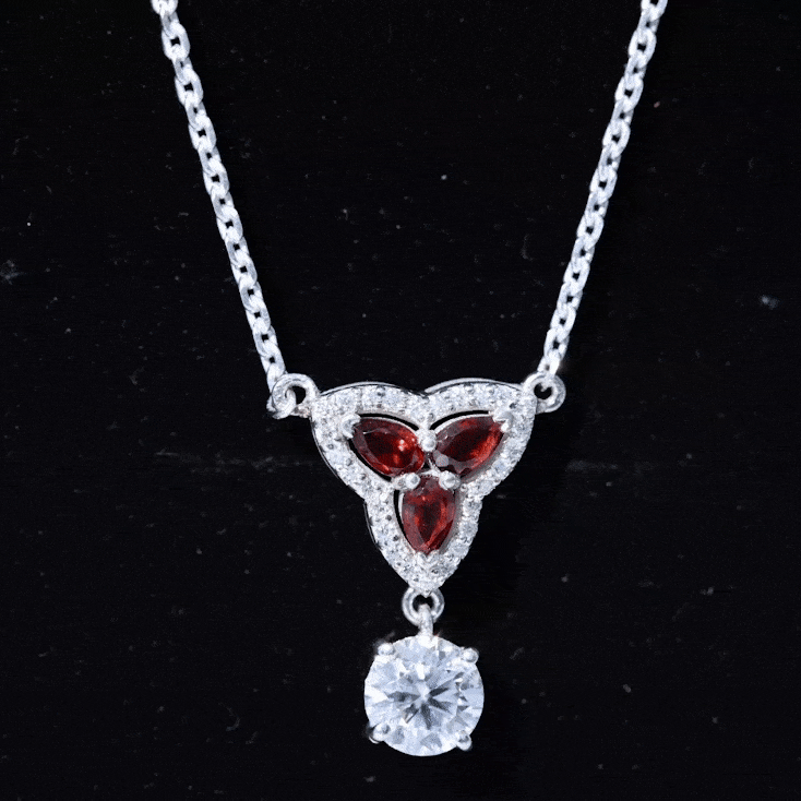 Yellow gold lab grown diamond and garnet pendant necklace featuring a 1-carat diamond dangle, by Rosec Jewels.