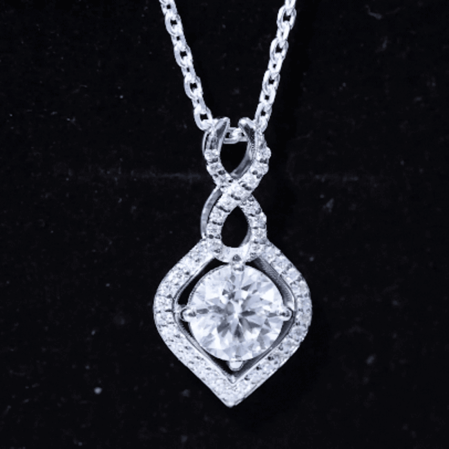Yellow gold pendant necklace with 8 mm round lab-grown diamond infinity loop design by Rosec Jewels