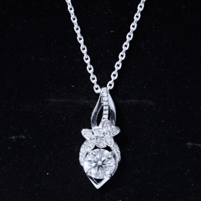 Yellow lab-grown diamond flower pendant necklace by Rosec Jewels featuring a delicate floral design and sparkling gemstone details.