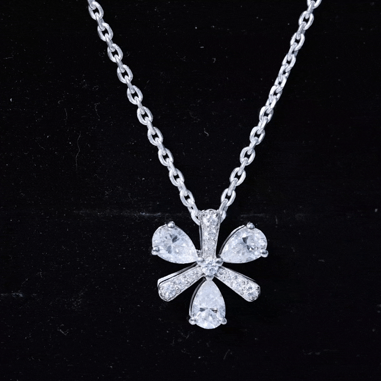 Yellow pear-shaped lab grown diamond flower pendant necklace by Rosec Jewels featuring a delicate floral design.