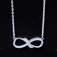 Lab Grown Diamond Infinity Knot Necklace with Accent