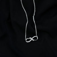 Lab Grown Diamond Infinity Knot Necklace with Accent
