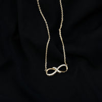 Lab Grown Diamond Infinity Knot Necklace with Accent