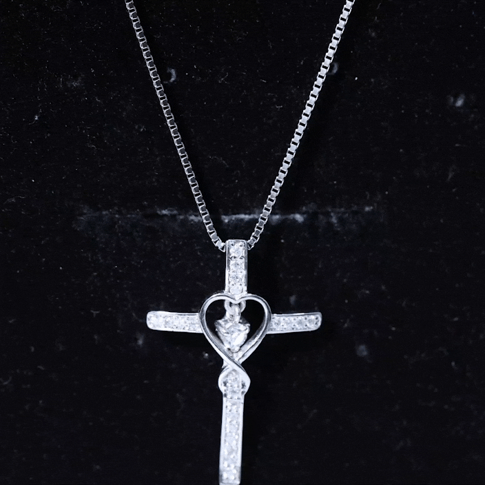 Yellow lab grown diamond cross heart pendant from Rosec Jewels with sparkling diamonds and intricate pendant design.