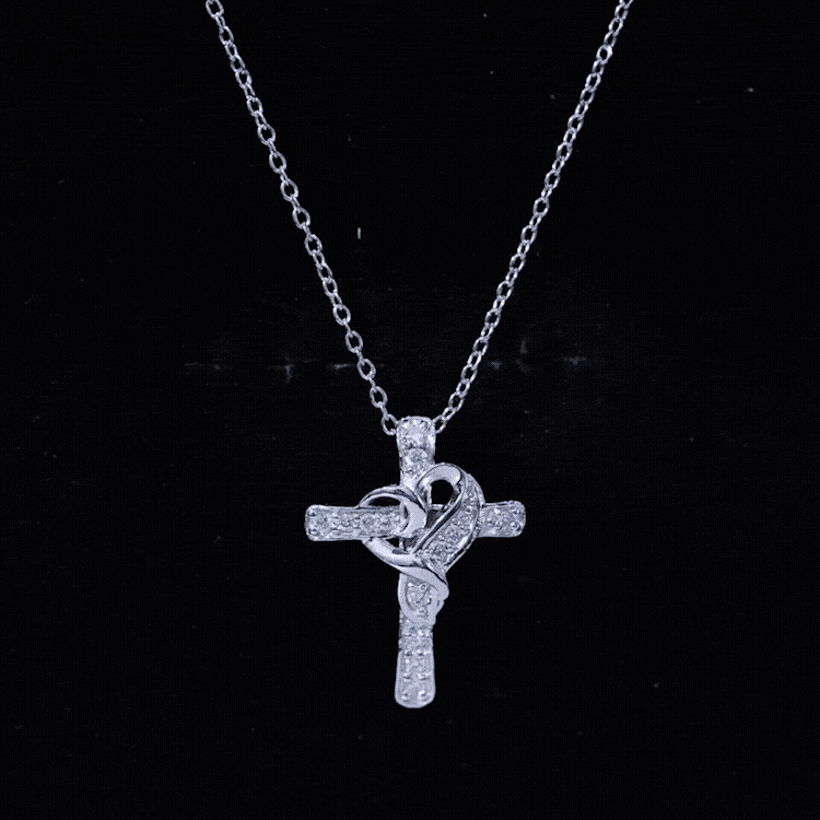 Yellow gold pendant featuring a heart-shaped lab grown diamond cross necklace from Rosec Jewels.