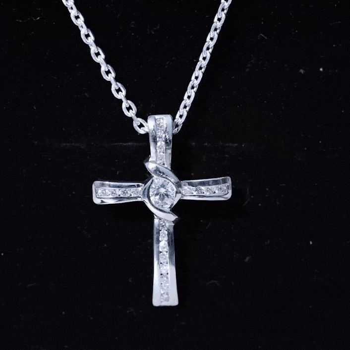 Yellow bezel set lab-grown diamond cross pendant by Rosec Jewels, featuring a radiant religious necklace design.