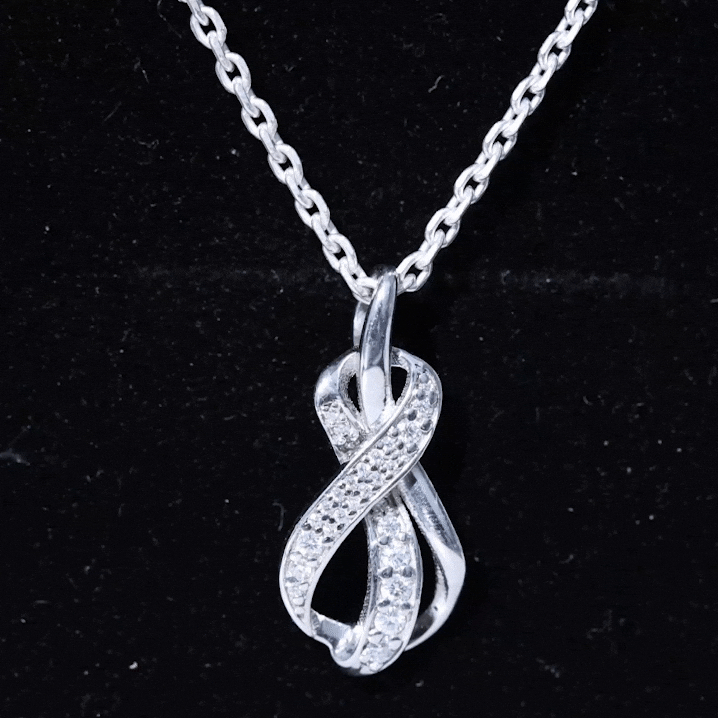 Yellow lab-grown diamond infinity loop pendant necklace from Rosec Jewels, showcasing sparkling diamonds on a delicate chain.