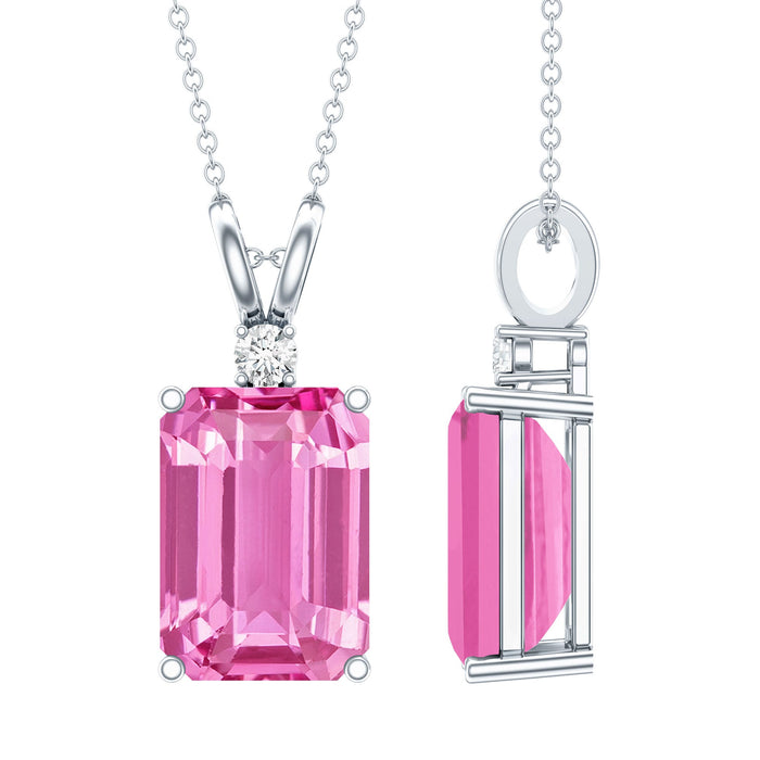 Lab-grown pink sapphire pendant with emerald cut, set on a silver chain from Rosec Jewels.
