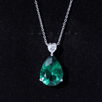 Lab grown emerald pendant necklace with chain, featuring a 9-carat statement emerald from Rosec Jewels.