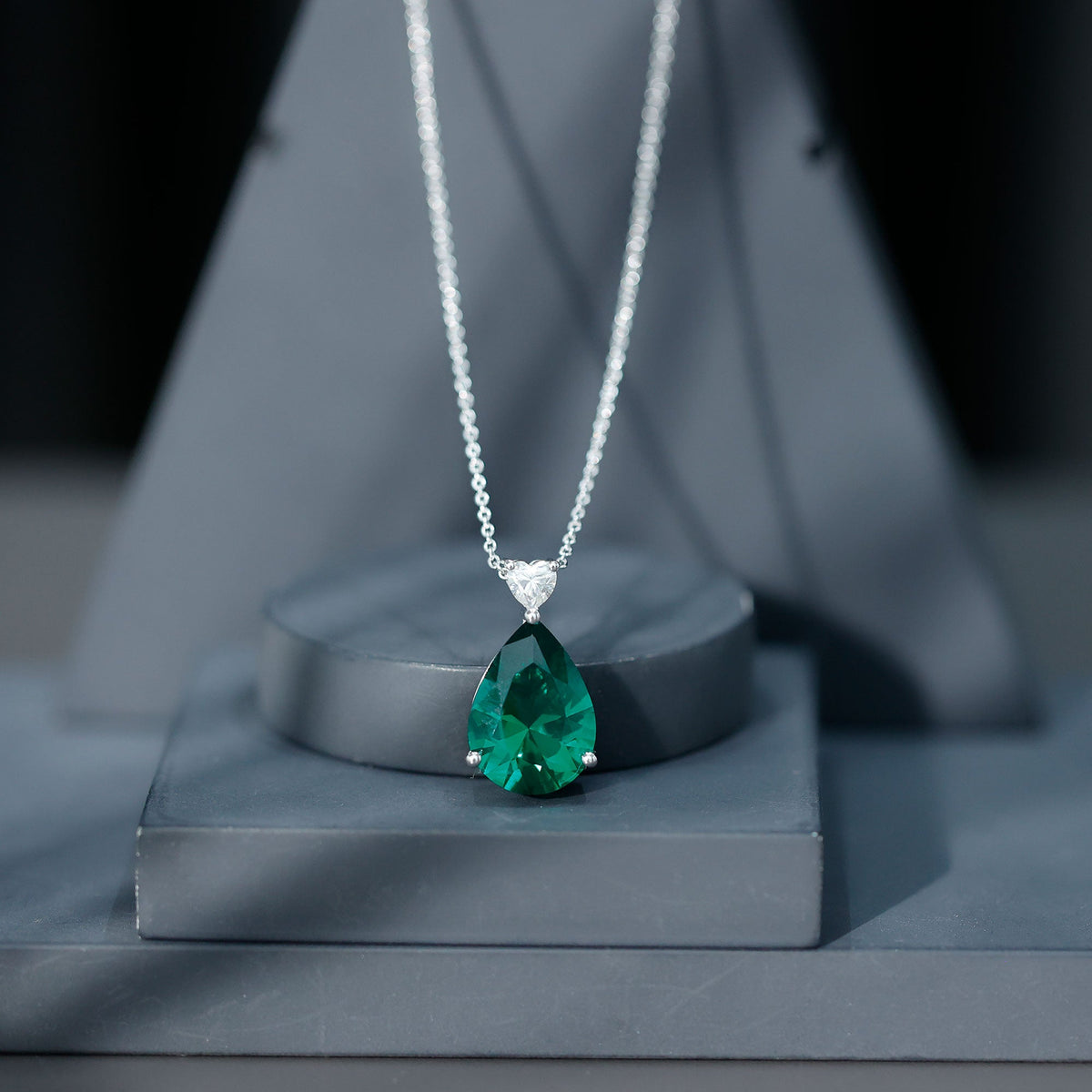 Lab-grown emerald pendant necklace with chain, featuring a 9-carat emerald gemstone and elegant jewelry design by Rosec Jewels.