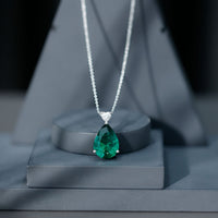 Lab-grown emerald pendant necklace with chain, featuring a 9-carat emerald gemstone and elegant jewelry design by Rosec Jewels.
