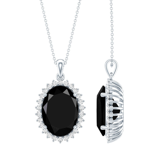 Oval black diamond pendant necklace with 14 carat gold lab-grown diamond, set on a silver chain, by Rosec Jewels.