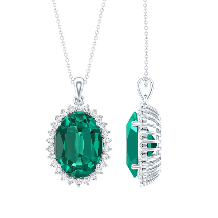 Lab grown emerald pendant necklace with silver chain by Rosec Jewels, showcasing a vibrant 14 carat gemstone in a statement design.