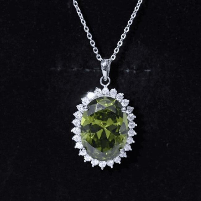 14 carat lab-grown green sapphire pendant necklace with silver chain from Rosec Jewels, showcasing a striking green gemstone.