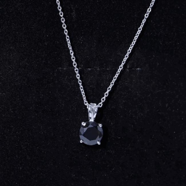 Lab created black diamond solitaire pendant necklace from Rosec Jewels featuring a 2-carat black diamond pendant on a chain.