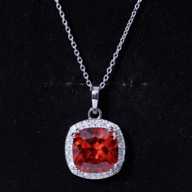 Lab grown orange sapphire pendant with silver chain, certified 9 carats, from Rosec Jewels, showcasing a stunning bridal necklace.