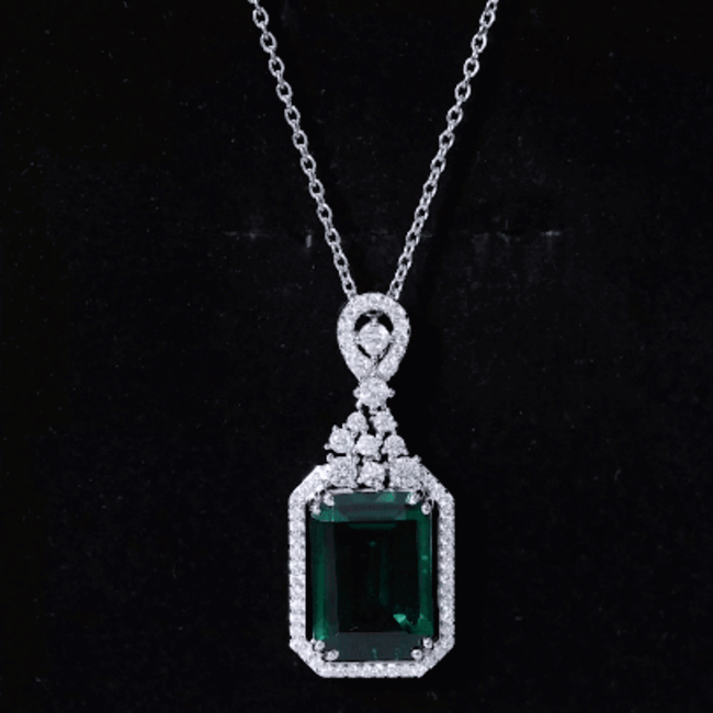 Lab grown emerald vintage pendant necklace with 8.2 carats set in silver chain, from Rosec Jewels.