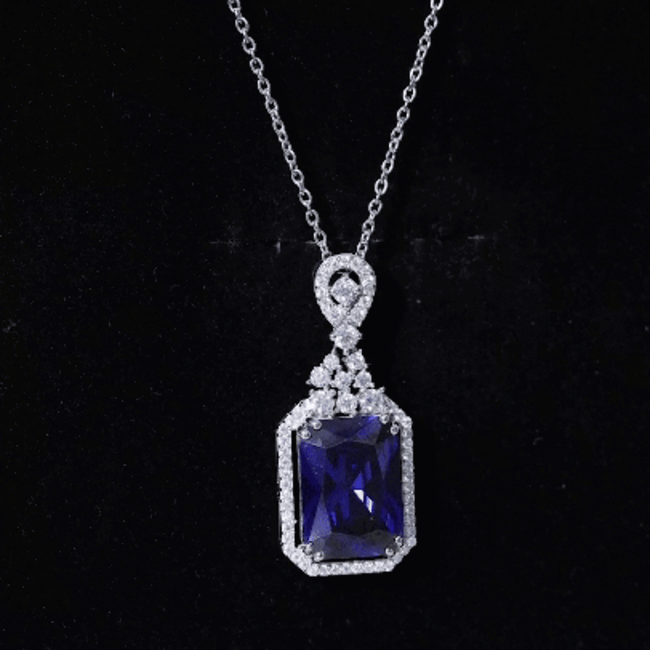 Lab grown blue sapphire vintage pendant necklace with silver chain by Rosec Jewels, showcasing a 9-carat sapphire centerpiece.