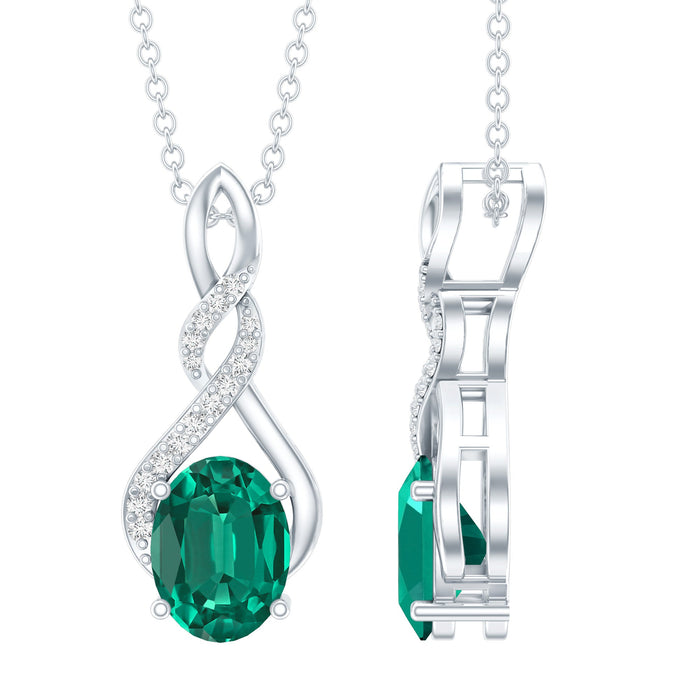 Lab grown 1.25 carat emerald infinity pendant on silver chain by Rosec Jewels, showcasing the vibrant green gemstone and elegant design.