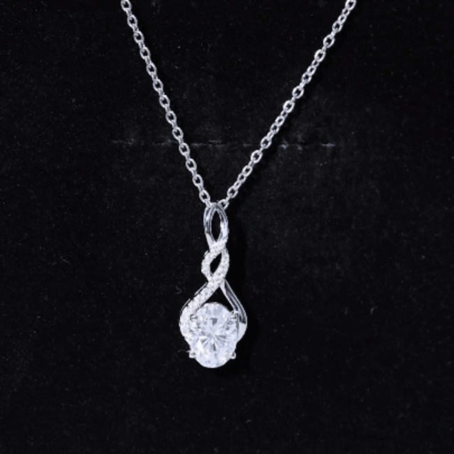 Sterling silver 1.25 carat Moissanite infinity pendant necklace with sparkling gemstone from Rosec Jewels.