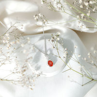 1.5 Carat Lab Grown Orange Sapphire Infinity Pendant Necklace with Moissanite