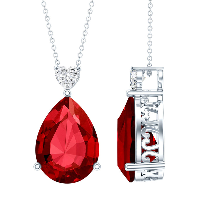 Lab grown ruby teardrop pendant with heart-shaped moissanite on a delicate chain, jewelry from Rosec Jewels.