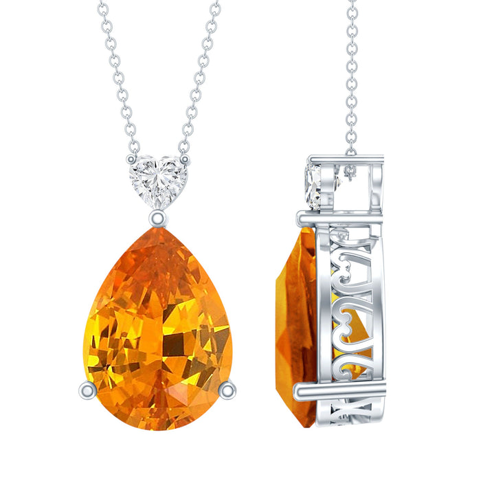 Pear-shaped lab-grown orange sapphire pendant with silver chain, teardrop design, from Rosec Jewels.