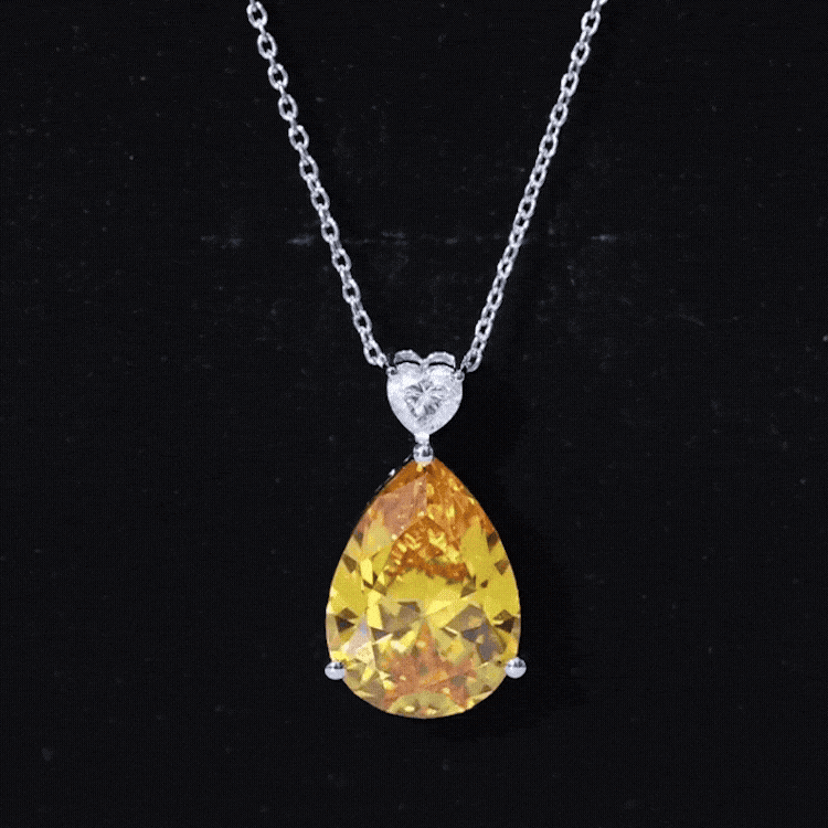 9 carat lab-grown yellow sapphire teardrop pendant necklace with silver chain, featuring a polished teardrop gemstone from Rosec Jewels.