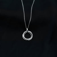 Certified diamond eternity circle pendant necklace for women by Rosec Jewels, featuring sparkling diamonds in a circular design.