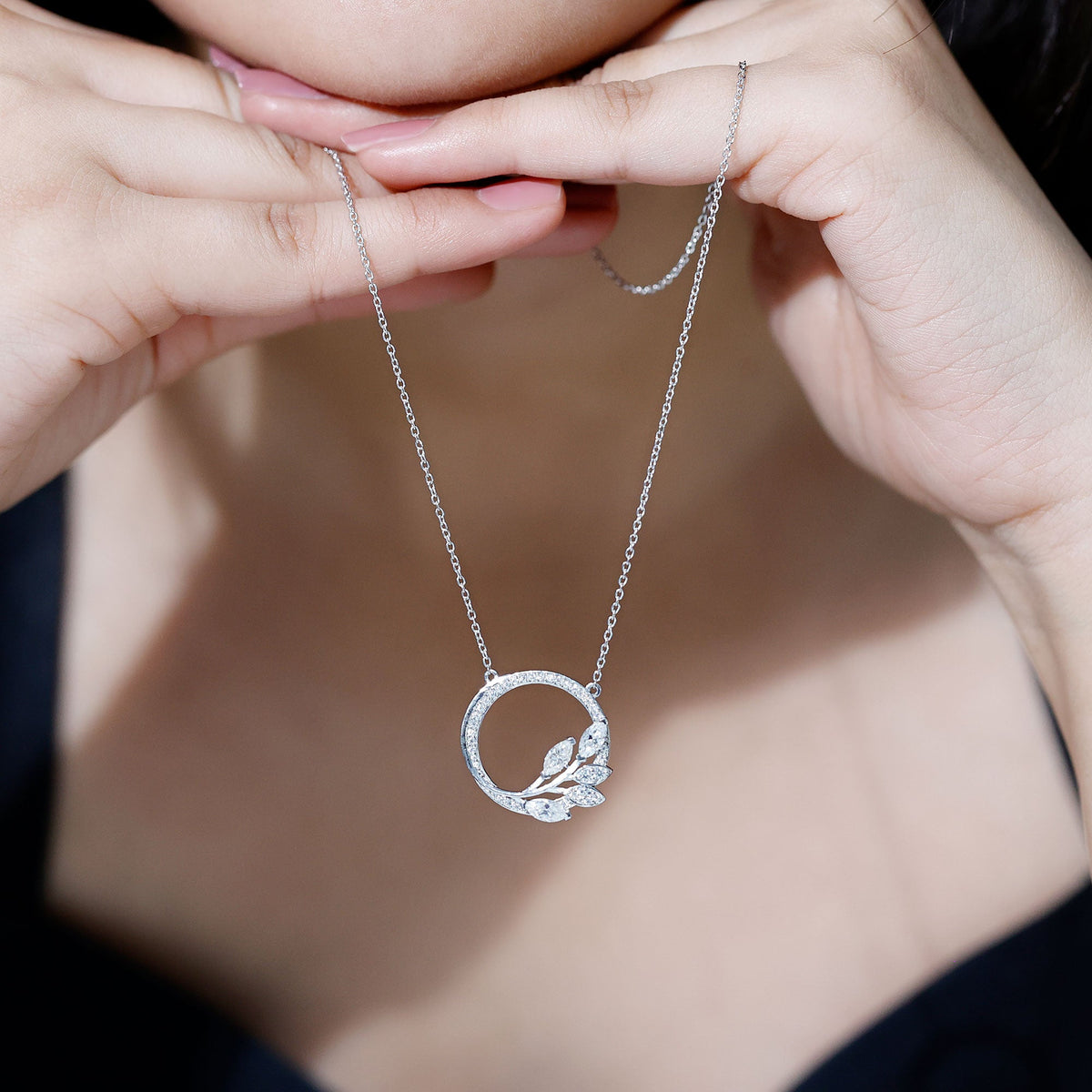 Elegant marquise and round cut moissanite leaf eternity pendant necklace by Rosec Jewels, featuring sparkling gemstones and intricate design.