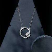 Marquise and round cut moissanite leaf pendant necklace by Rosec Jewels, featuring sparkling gemstone accents on a delicate chain.