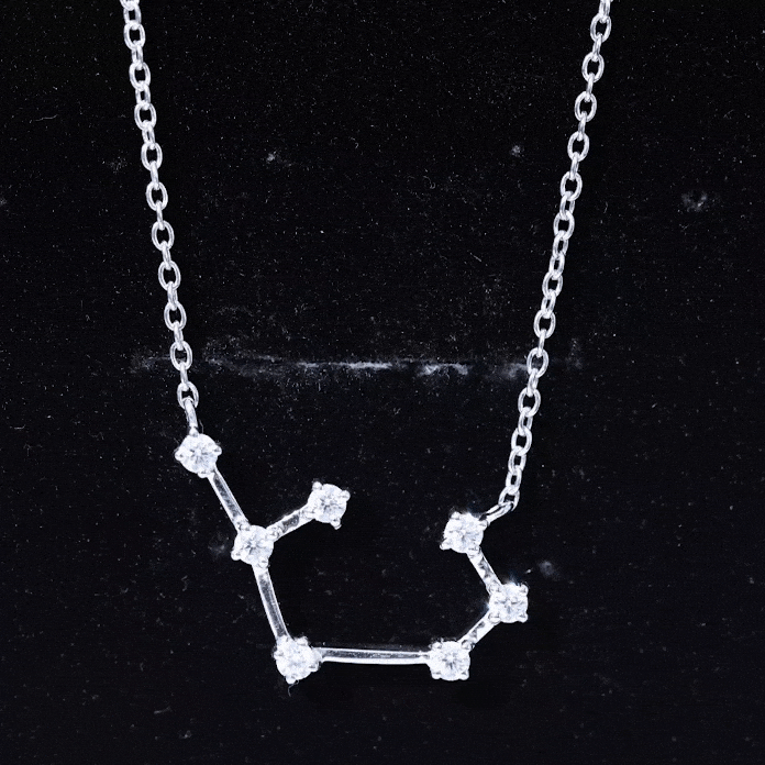Yellow gold Sagittarius zodiac constellation necklace with moissanite pendant by Rosec Jewels, featuring star and constellation design.