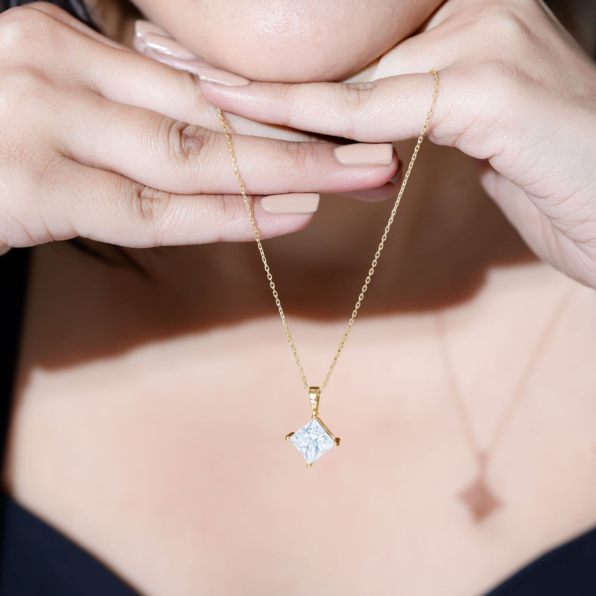 Diagonal set of three 3-carat cubic zirconia princess cut pendants with chain from Rosec Jewels, showcasing elegant jewelry design.