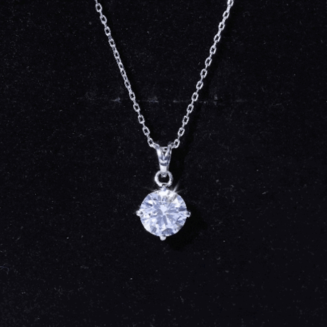 Elegant 2 carat cubic zirconia solitaire pendant on a silver chain, by Rosec Jewels, displayed on a white background.