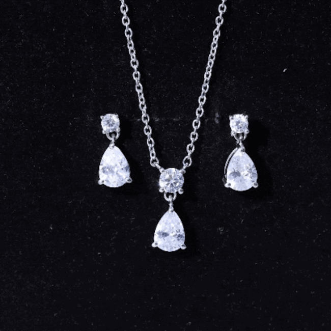 Rosec Jewels cubic zirconia drop necklace and earrings set featuring sparkling 3 carat pendants with elegant white stones.